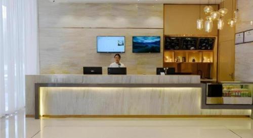 Televisyen dan/atau pusat hiburan di City Comfort Inn Luocheng Bus Terminal