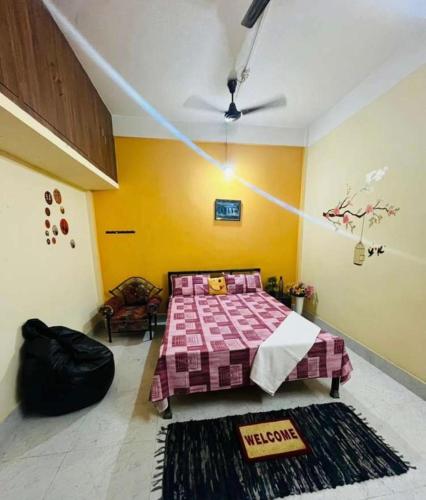 Ένα ή περισσότερα κρεβάτια σε δωμάτιο στο Sangrag Homestay