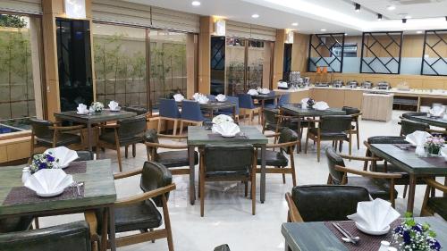 مطعم أو مكان آخر لتناول الطعام في Black Sands Hotel Jeju