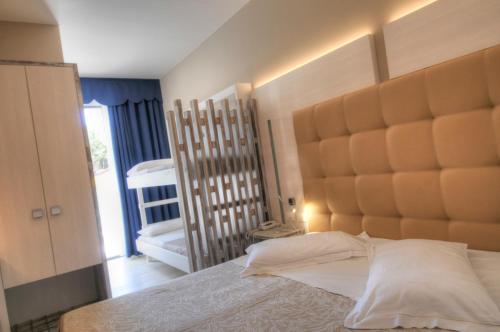 Postel nebo postele na pokoji v ubytování Hotel Franz