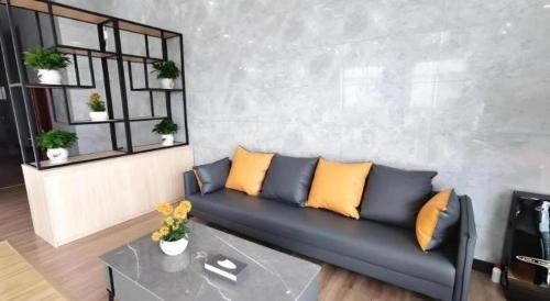 Ein Sitzbereich in der Unterkunft GreenTree Inn Express Jiangsu Taizhou North High-Speed Railway Station