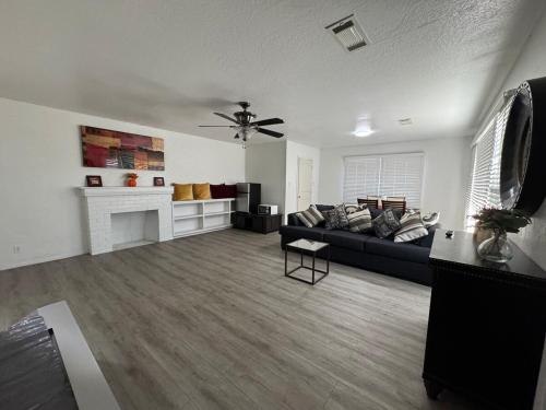a living room with a couch and a fireplace at Reyes Guess home in Marysville