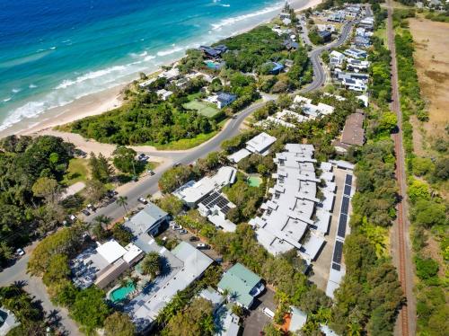 an aerial view of the beach and the ocean at East On Byron Bay Apartments in Byron Bay