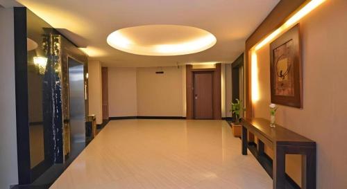 a hallway of a building with a hallway sidx sidx sidx at The Axana Hotel in Padang