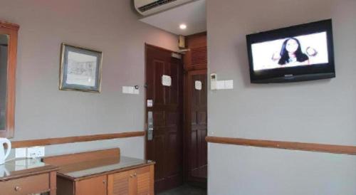 Μια τηλεόραση ή/και κέντρο ψυχαγωγίας στο Four Chain View Hotel