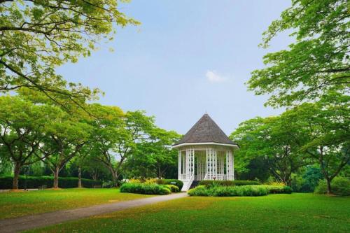 a gazebo in the middle of a park at Hotel Miramar Singapore in Singapore