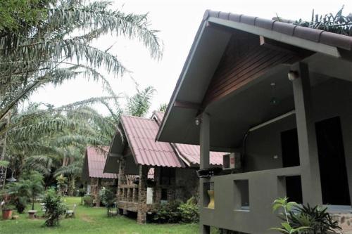 a view of a house with a red roof at Ma-Kham Forest Resort in Nakhon Nayok