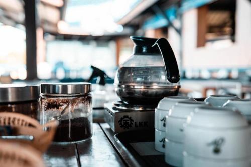 a coffee pot sitting on top of a counter at Bangsaen Villa Hotel in Si Racha