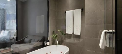 Ein Badezimmer in der Unterkunft Shenzhen Hanyong Hotel Fuyong Branch