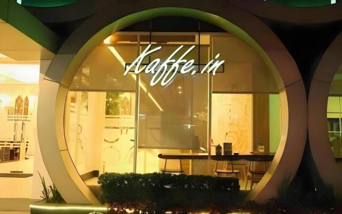 a store front with a table in the window at Fovere Hotel Palangkaraya in Palangkaraya