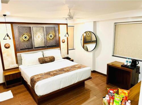 Katil atau katil-katil dalam bilik di Signature Hotels & Resorts- A Business Boutique Hotels- Banjara Hills