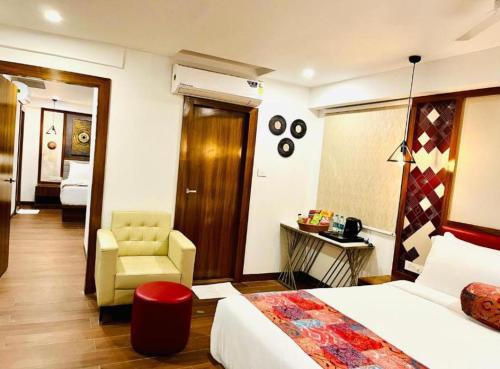 Katil atau katil-katil dalam bilik di Signature Hotels & Resorts- A Business Boutique Hotels- Banjara Hills