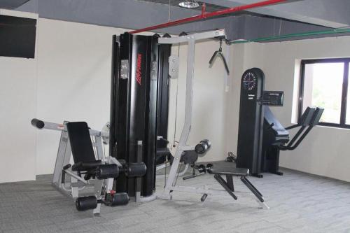 a room with a gym with several machines at CK Tanjungpinang Hotel and Convention Centre in Tanjung Pinang 