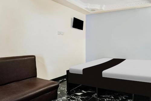 Μια τηλεόραση ή/και κέντρο ψυχαγωγίας στο Super Hotel O Russel Chowk Formerly VN Residency Jabalpur