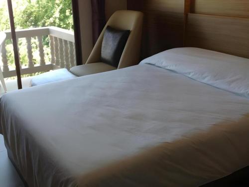Ένα ή περισσότερα κρεβάτια σε δωμάτιο στο Honey Lodge