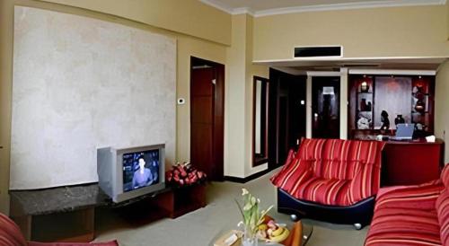 TV a/nebo společenská místnost v ubytování Yichang Three Gorges Project Hotel