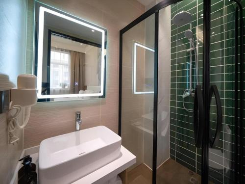 Ένα μπάνιο στο GreenTree Inn Express Hebei Shijiazhuang Zhengding County Changshan Dong Road