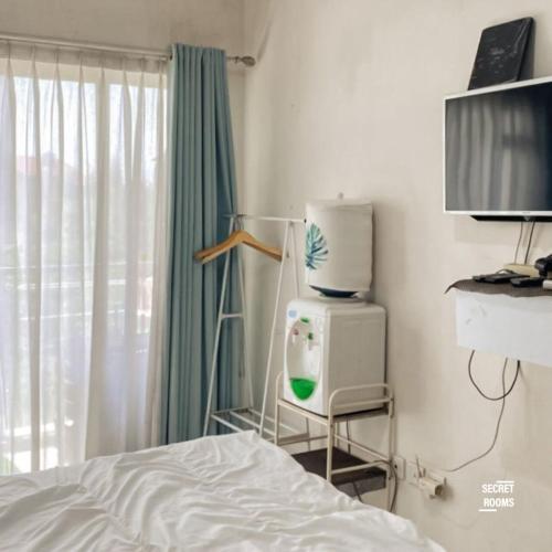 Katil atau katil-katil dalam bilik di Gateway Pasteur Apartment by Secret Rooms