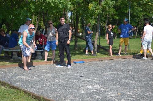 a group of people playing a game of frisbee at Hotel Kormorán in Šamorín