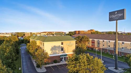 an overhead view of a building in a city at Country Inn & Suites by Radisson, Merrillville, IN in Merrillville