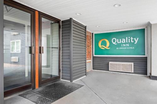 an entrance to a building with a sign on it at Quality Inn in West Haven