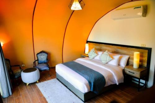 Ένα ή περισσότερα κρεβάτια σε δωμάτιο στο Luxury Spiral Camp