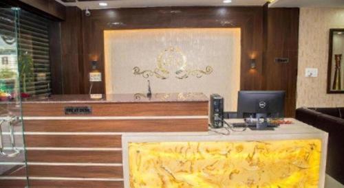 a office with a desk with a computer on it at Hotel Gajur Palace in Itahari