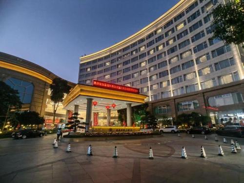 a hotel with a lot of cones in front of it at Putian Haiyuan International Hotel in Putian