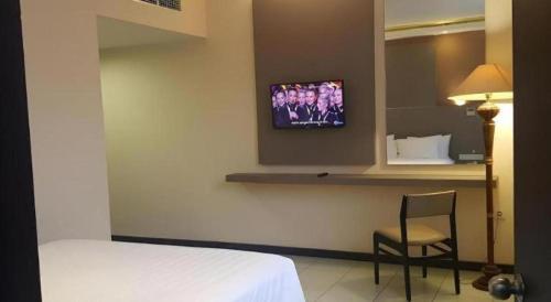 Μια τηλεόραση ή/και κέντρο ψυχαγωγίας στο Kharisma Hotel