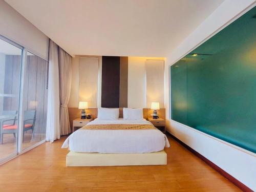 Ένα ή περισσότερα κρεβάτια σε δωμάτιο στο Luxury Residence Klong Muang Beach Front , Krabi