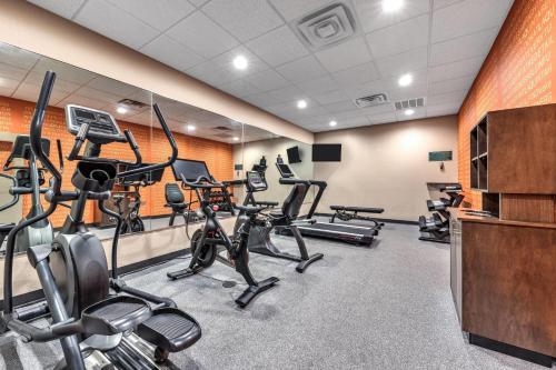 a gym with several treadmills and exercise bikes at La Quinta by Wyndham Marble Falls in Marble Falls