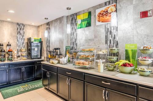 a buffet line with food on display in a restaurant at Quality Inn & Suites Westminster - Broomfield in Westminster