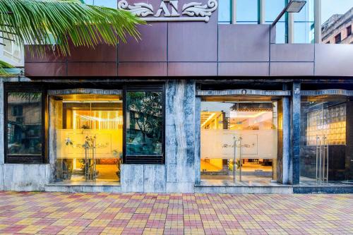 a store front of a building with windows at FabHotel Aafreen International in Kolkata