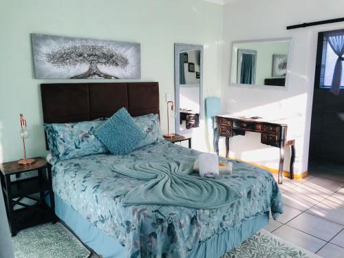 Ένα ή περισσότερα κρεβάτια σε δωμάτιο στο Sondela Bed and Breakfast