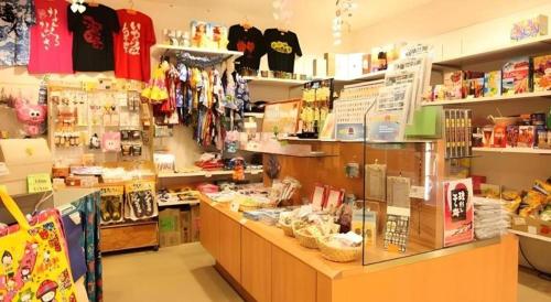 a store with a display of merchandise in a store at Okinawa Sunplaza Hotel in Naha