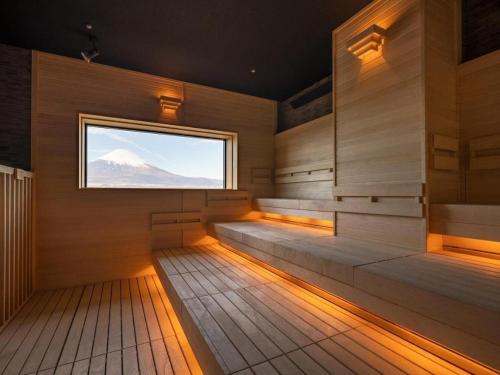 a sauna with a view of a mountain at HOTEL CLAD in Fuji