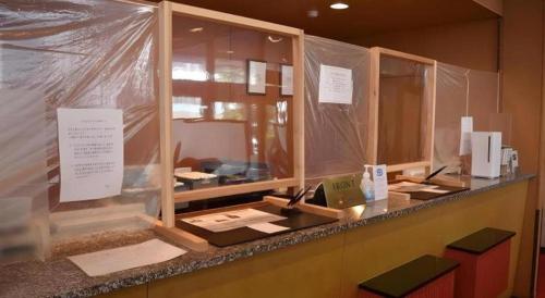 a counter in a store with plastic wrap on it at AI HOTEL OYAMA in Sano