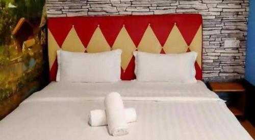 Un ou plusieurs lits dans un hébergement de l'établissement Hotel Zamburger Enstek