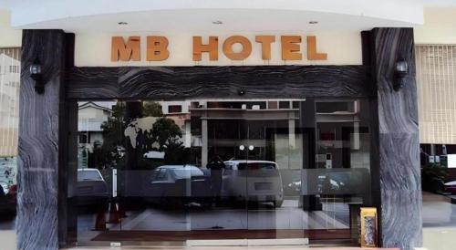 a store front with a no hotel sign on it at MB Hotel in Tawau