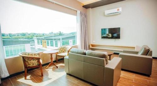 Телевизор и/или развлекательный центр в Friendly Hotel