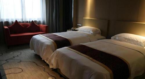 Cama o camas de una habitación en Ramada by Wyndham Xi'an Bell Tower
