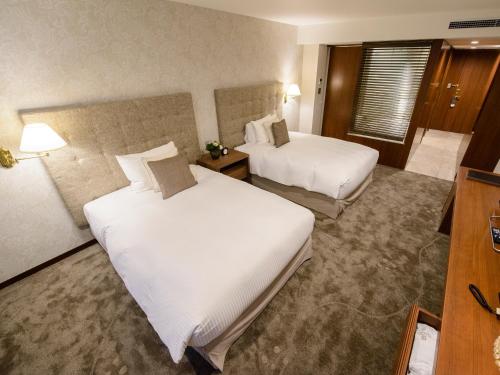 Cama o camas de una habitación en Le Grand Kyu Karuizawa