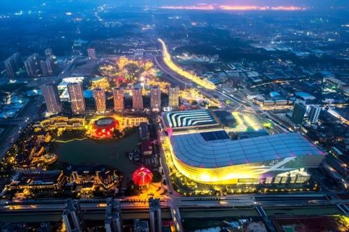 an aerial view of a city at night at Imin Hotel in Huadu