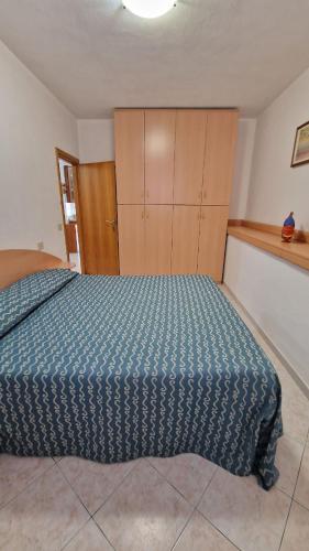 Postel nebo postele na pokoji v ubytování Hotel Sardi