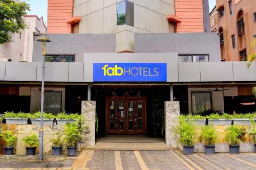 a building with a sign that reads fab hotels at FabHotel Ratna Regency in Chinchiwad