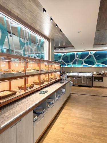 a bakery with a lot of food on display at Kai Bae Beach Resort Koh Chang in Ko Chang