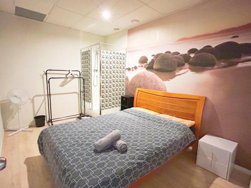 Postel nebo postele na pokoji v ubytování Sky World Cozy Home