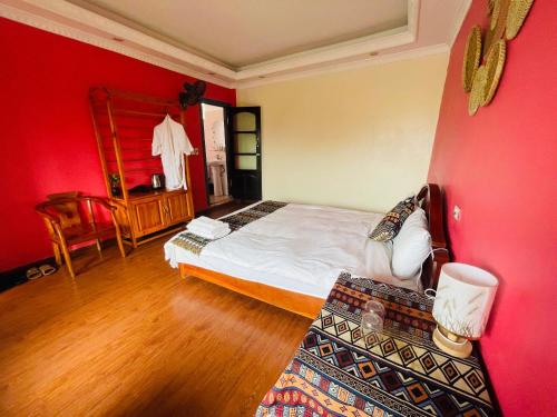 Ένα ή περισσότερα κρεβάτια σε δωμάτιο στο Sapa Binhlan Hostel