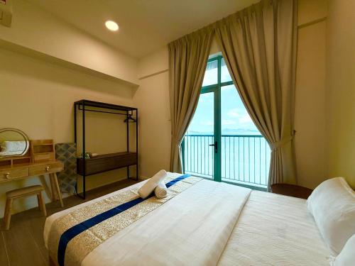 Ένα ή περισσότερα κρεβάτια σε δωμάτιο στο Bay Premier Suites by SSVC