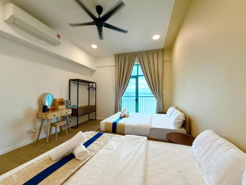 Ένα ή περισσότερα κρεβάτια σε δωμάτιο στο Bay Premier Suites by SSVC